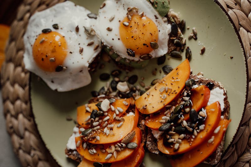 Avocado toast with eggs breakfast plate